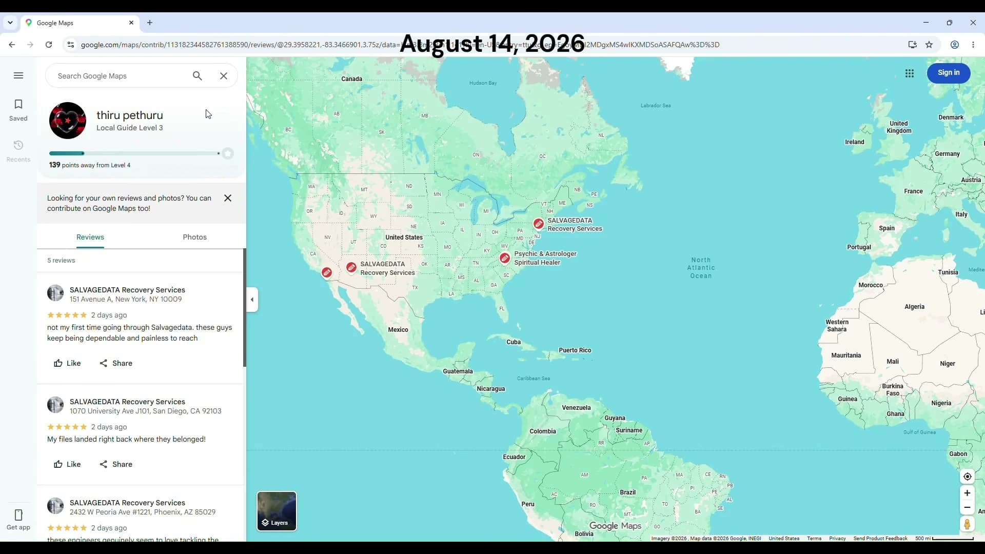 Google Maps contributor page for thiru pethuru, captured August 14, 2026, listing three five-star reviews of SALVAGEDATA Recovery Services in New York, San Diego, and Phoenix, each posted 2 days ago, with SalvageData pins and a Psychic and Astrologer Spiritual Healer pin on the map.