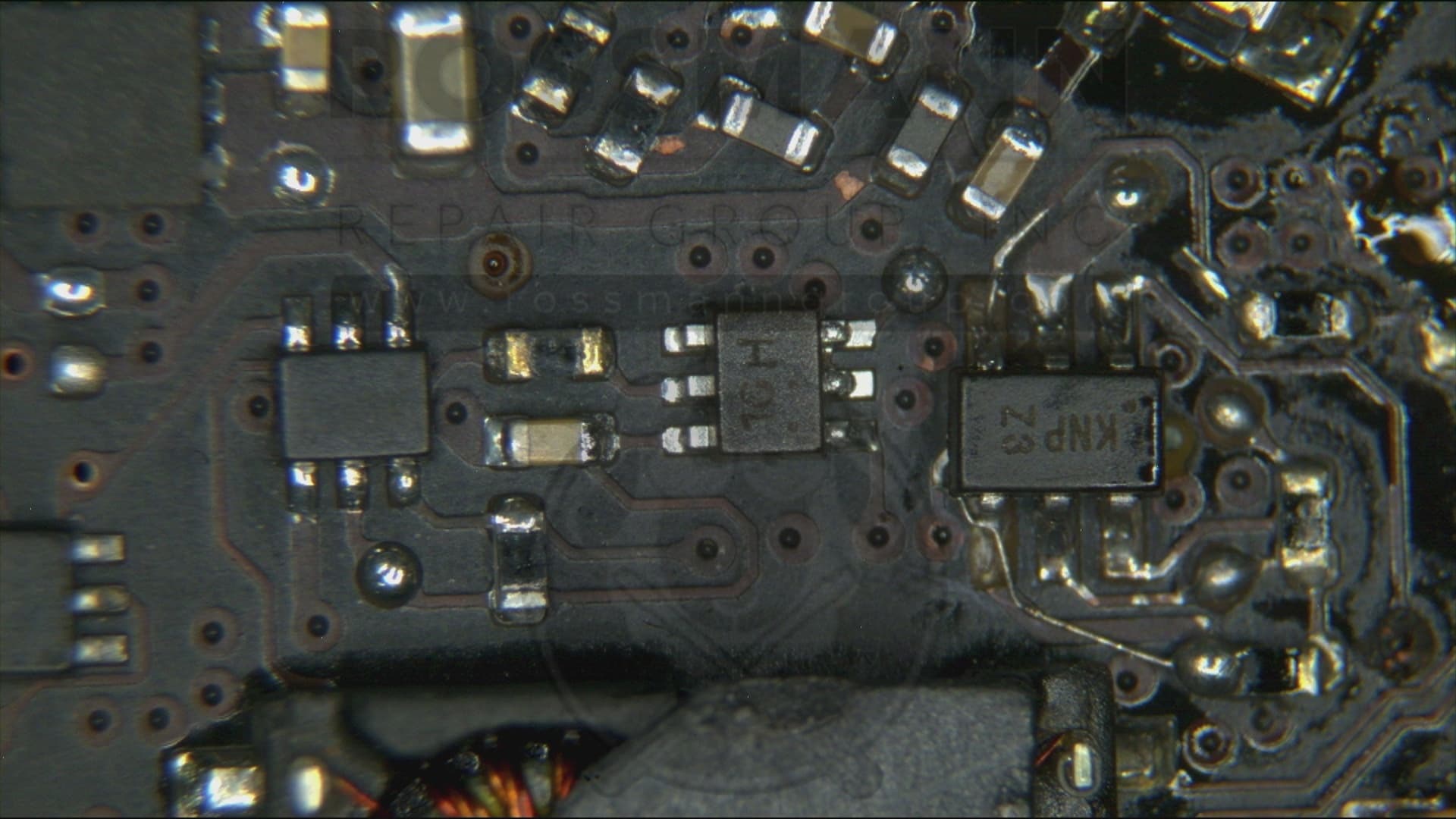 After: cleaned and repaired MacBook board