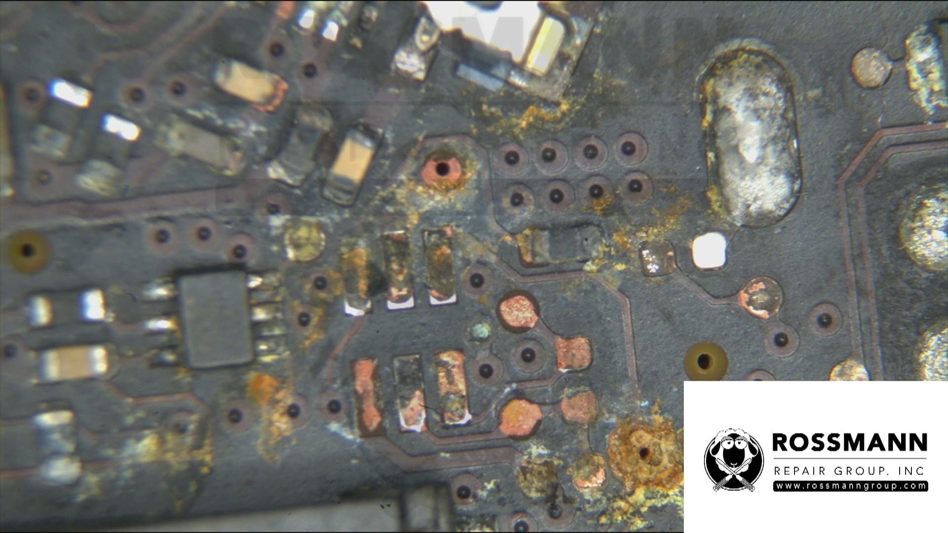 Before: heavy corrosion on MacBook logic board